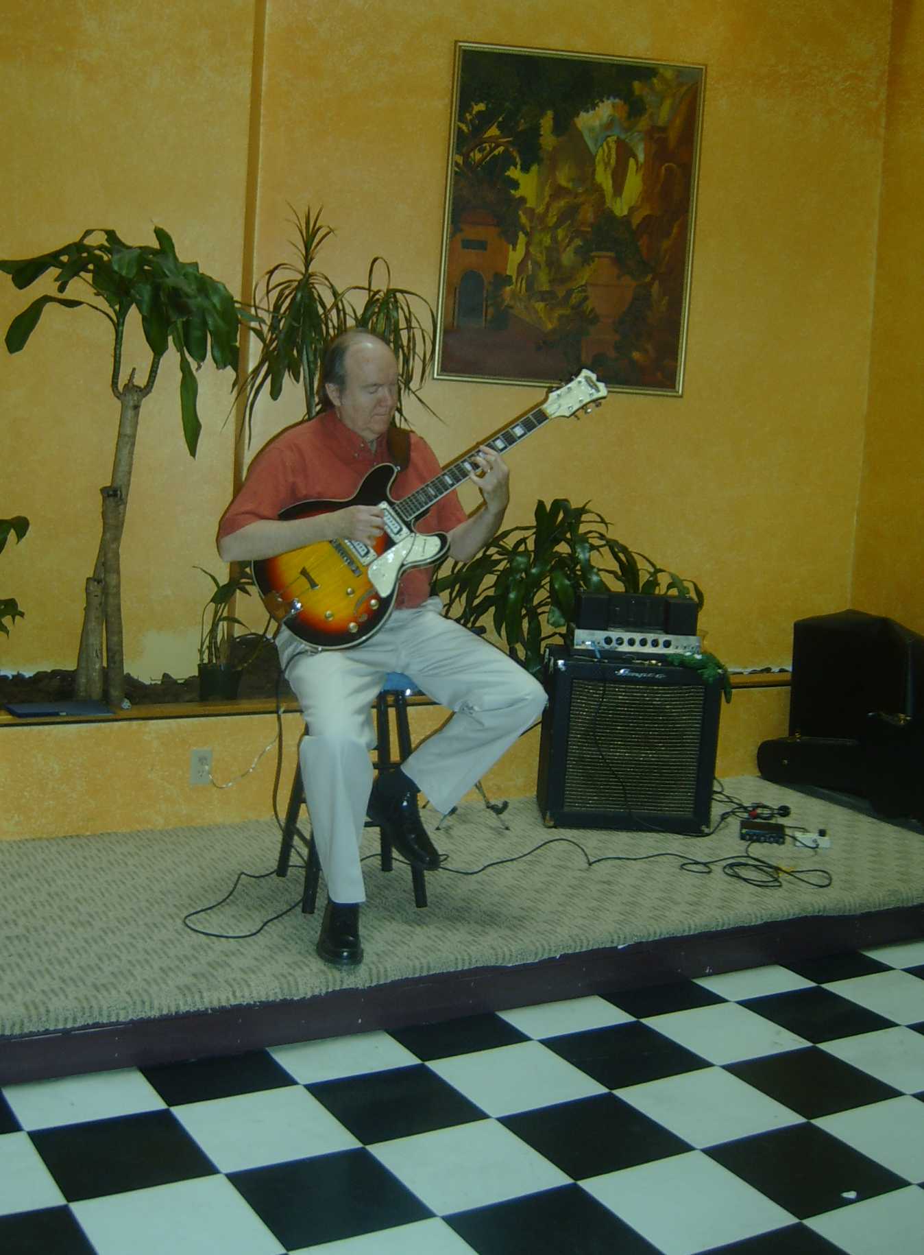 Steve Carter with guitar and amp at CCB